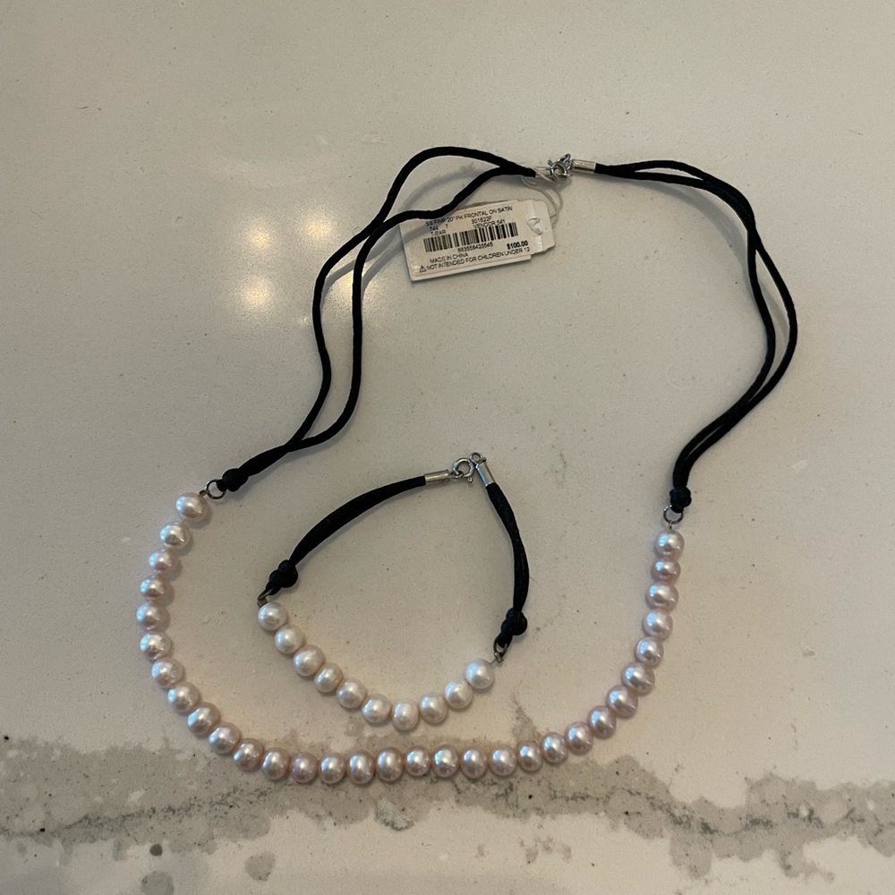 Fresh Water Pearls and Sterling Silver necklace and bracelet set from Macys